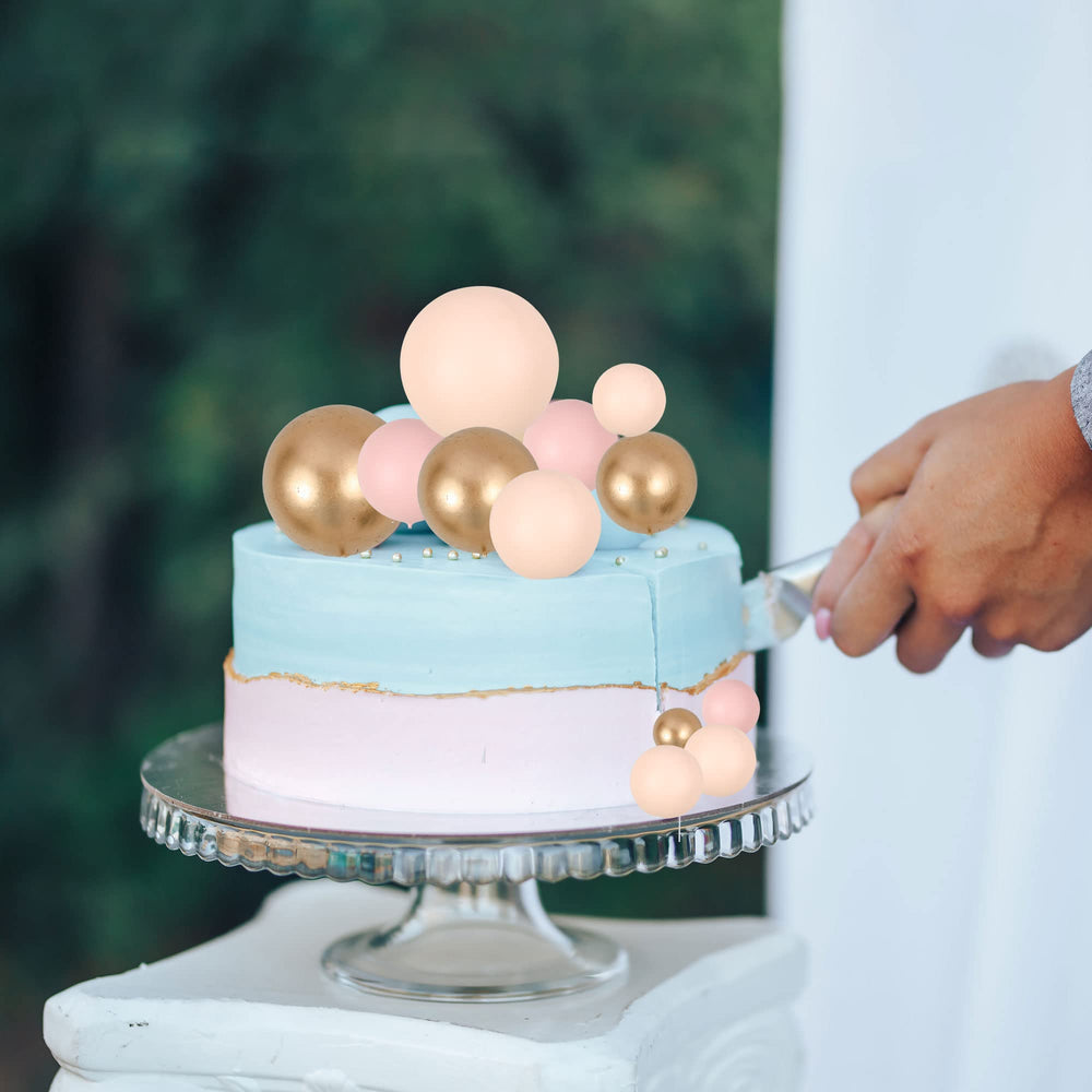 Gyufise ball cake topper in apricot gold provides safe decorative flair.