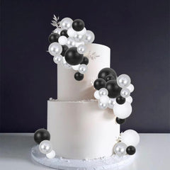 Gyufise ball cake toppers shown on desserts for quick festive decoration