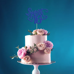 Gyufise blue party cake topper for a memorable 16th celebration.