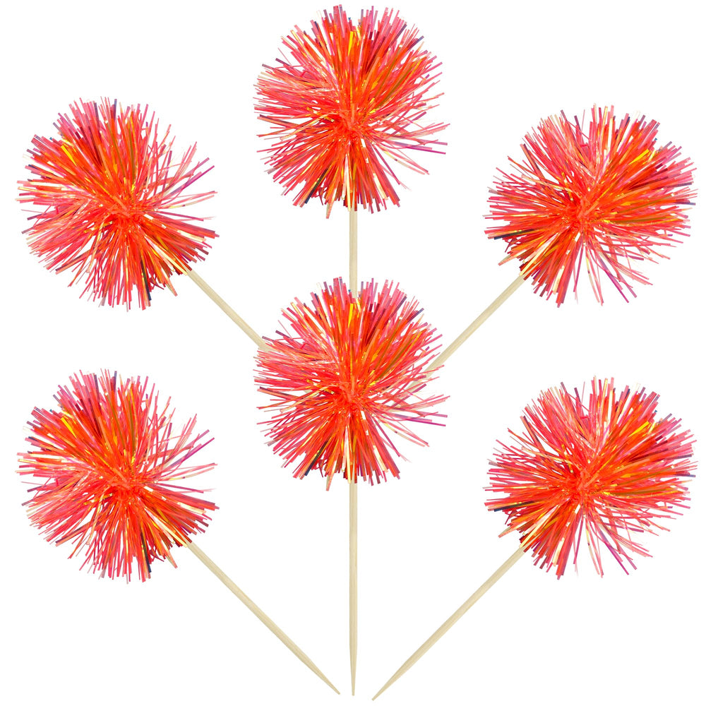 Gyufise cake decorations foil firework toppers on a frosting cake