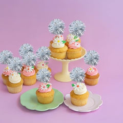 Gyufise foil-tinsel cake decorations add shimmer to desserts.