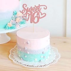 Gyufise Sweet 16 topper on fruit and desserts for display.