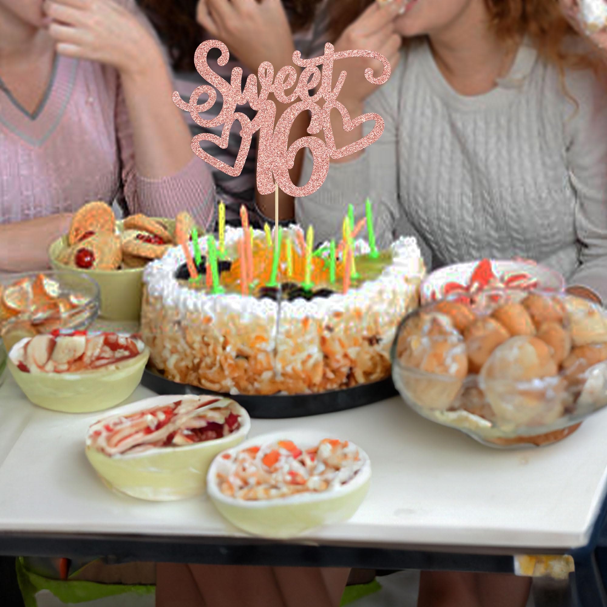 Gyufise Sweet 16 topper displayed on a cake.
