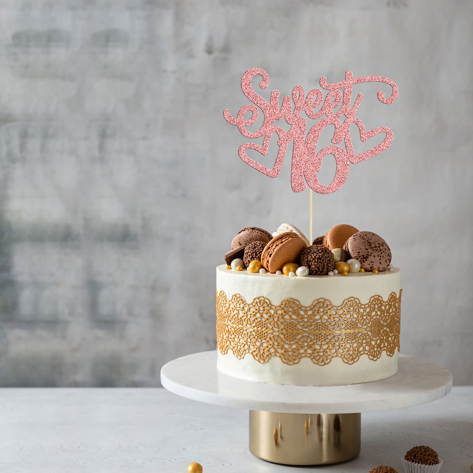 Gyufise Sweet 16 topper shows rose gold shine on dessert.