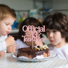Gyufise teenager birthday topper on cake detail with vibrant pink shine.