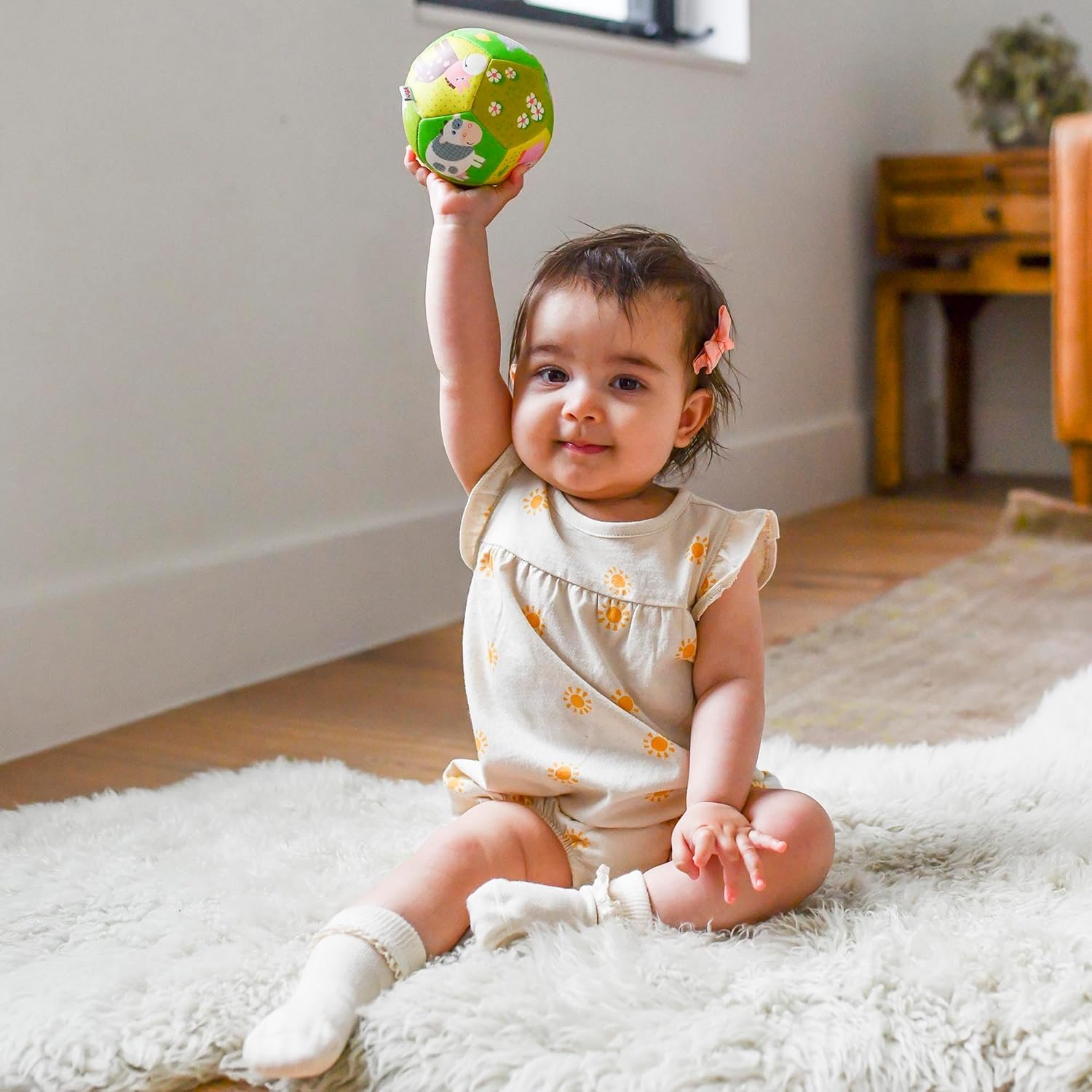 HABA baby ball for tummy time setup encourages early motor awareness.