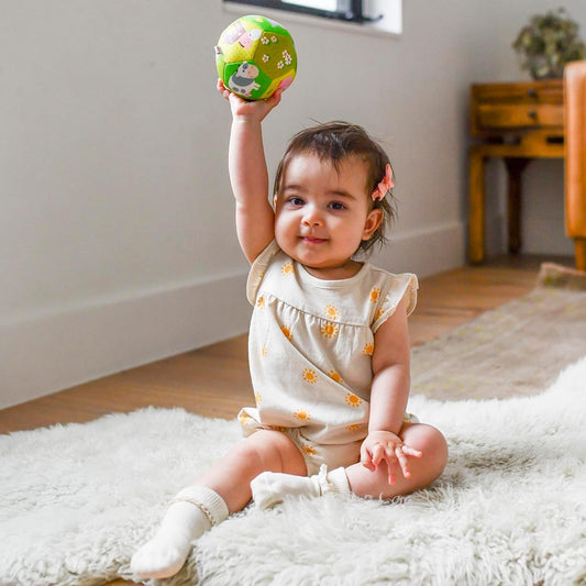 HABA baby ball for tummy time setup encourages early motor awareness.