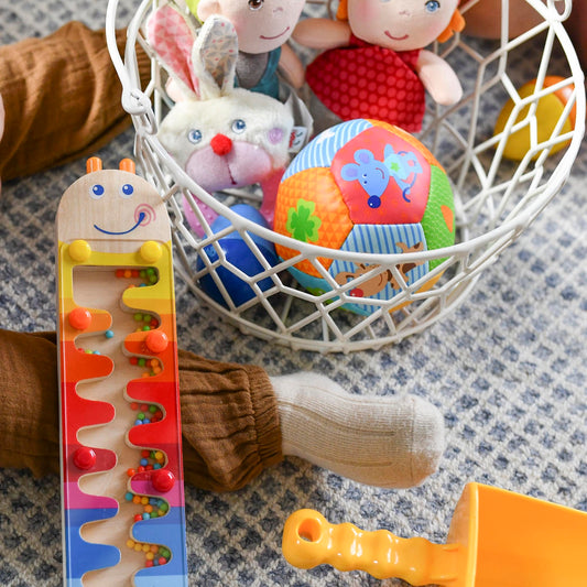 HABA Baby Balls showcase bright illustrations to spark imagination during independent play.