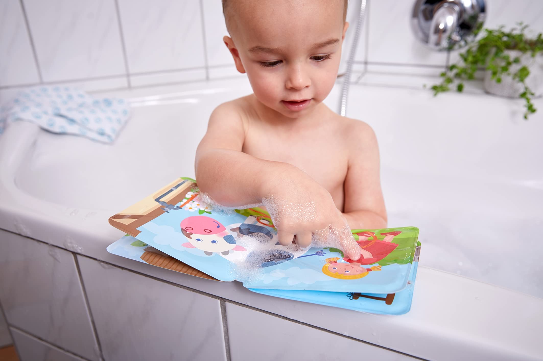 HABA bath book doubles as a water-table accessory for outdoor fun.