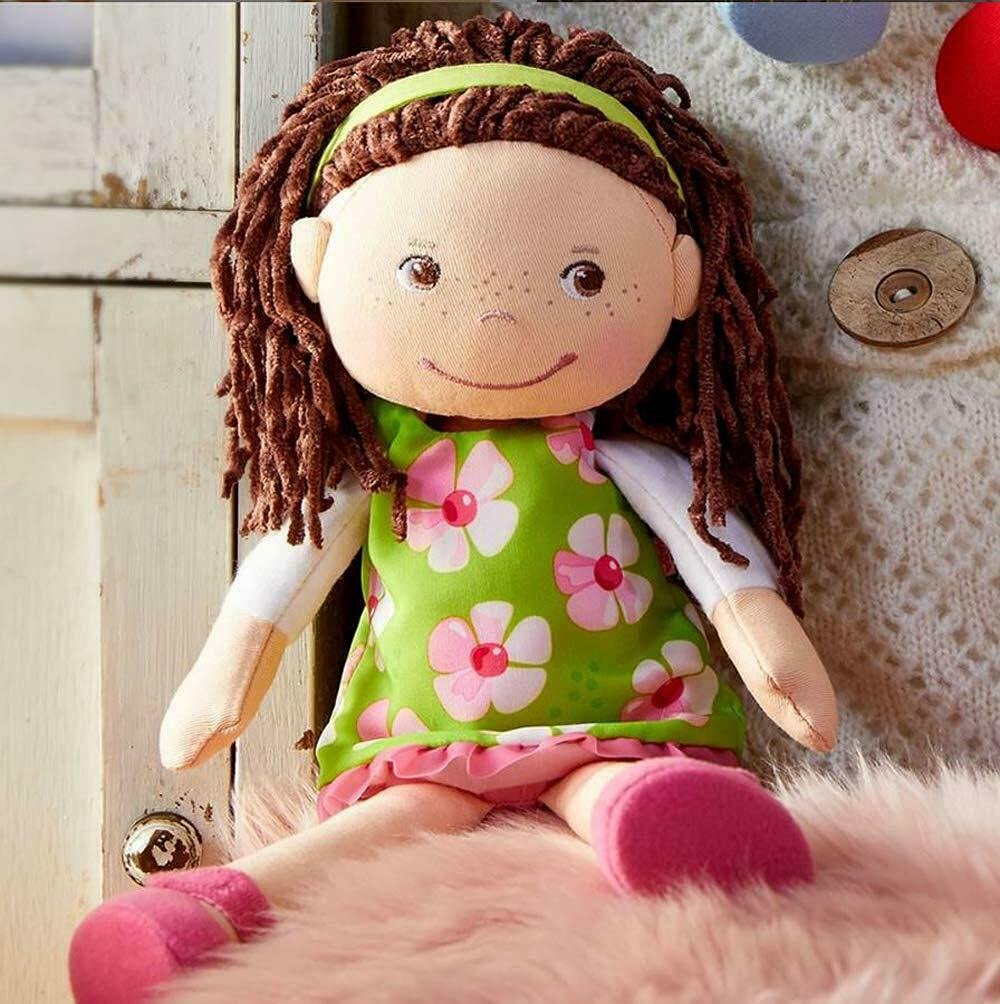 HABA Coco embroidery detail highlights friendly expression during play