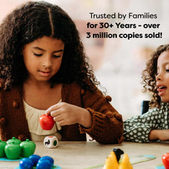 HABA First Orchard supports cozy family game nights.