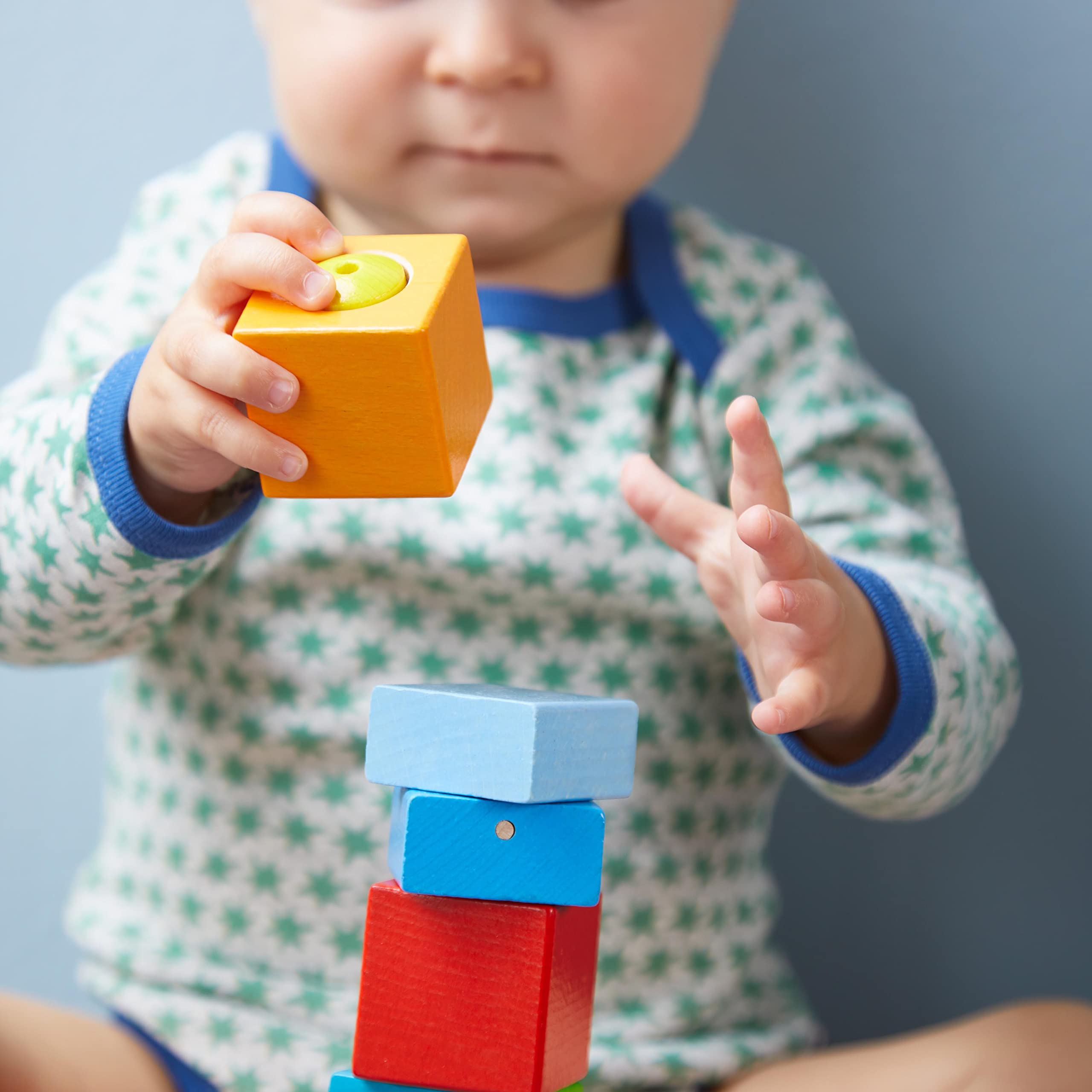 HABA Fun with Sounds blocks in use support stacking and imaginative play.