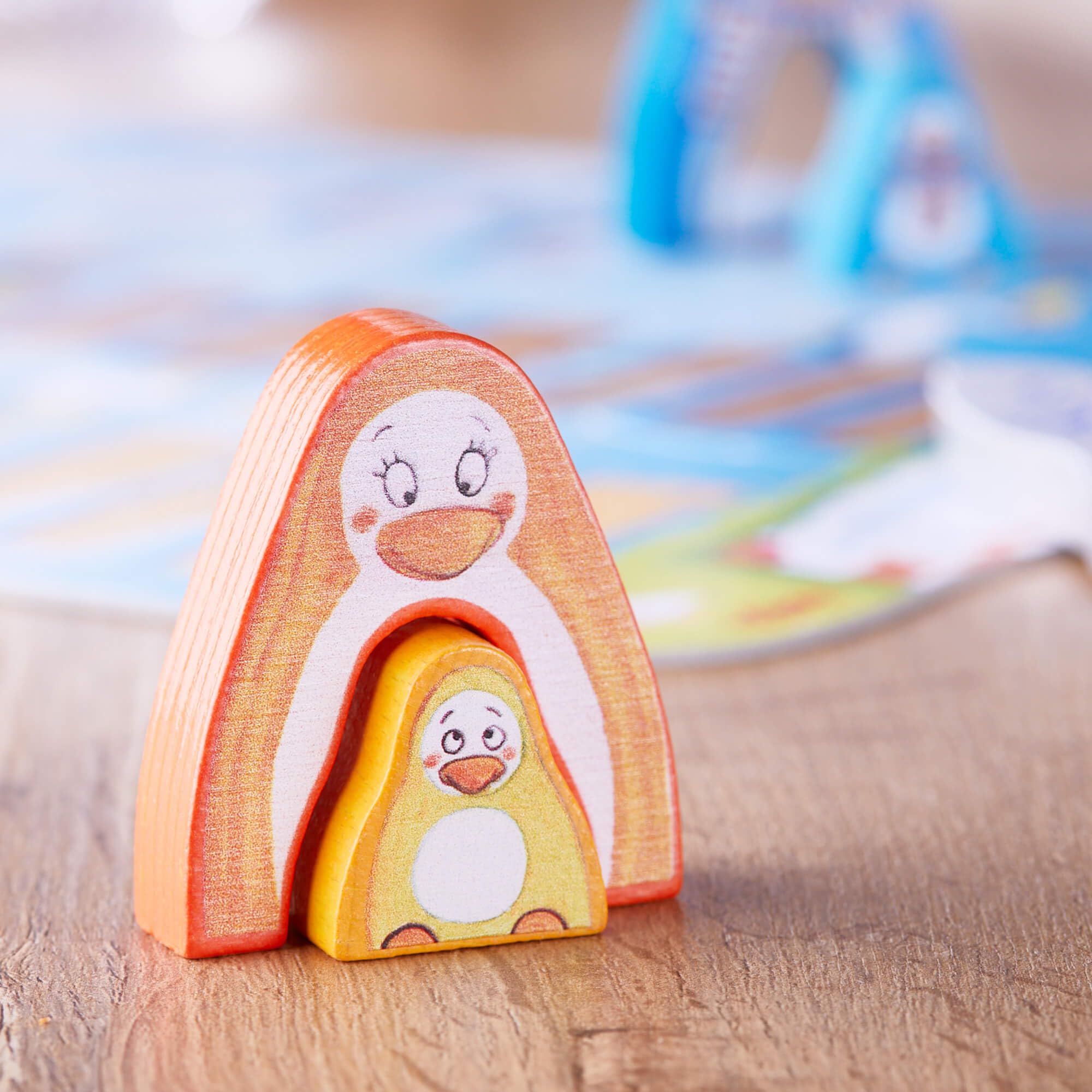 HABA Go, Go Little Penguin cooperative play scene highlighting social skills development.
