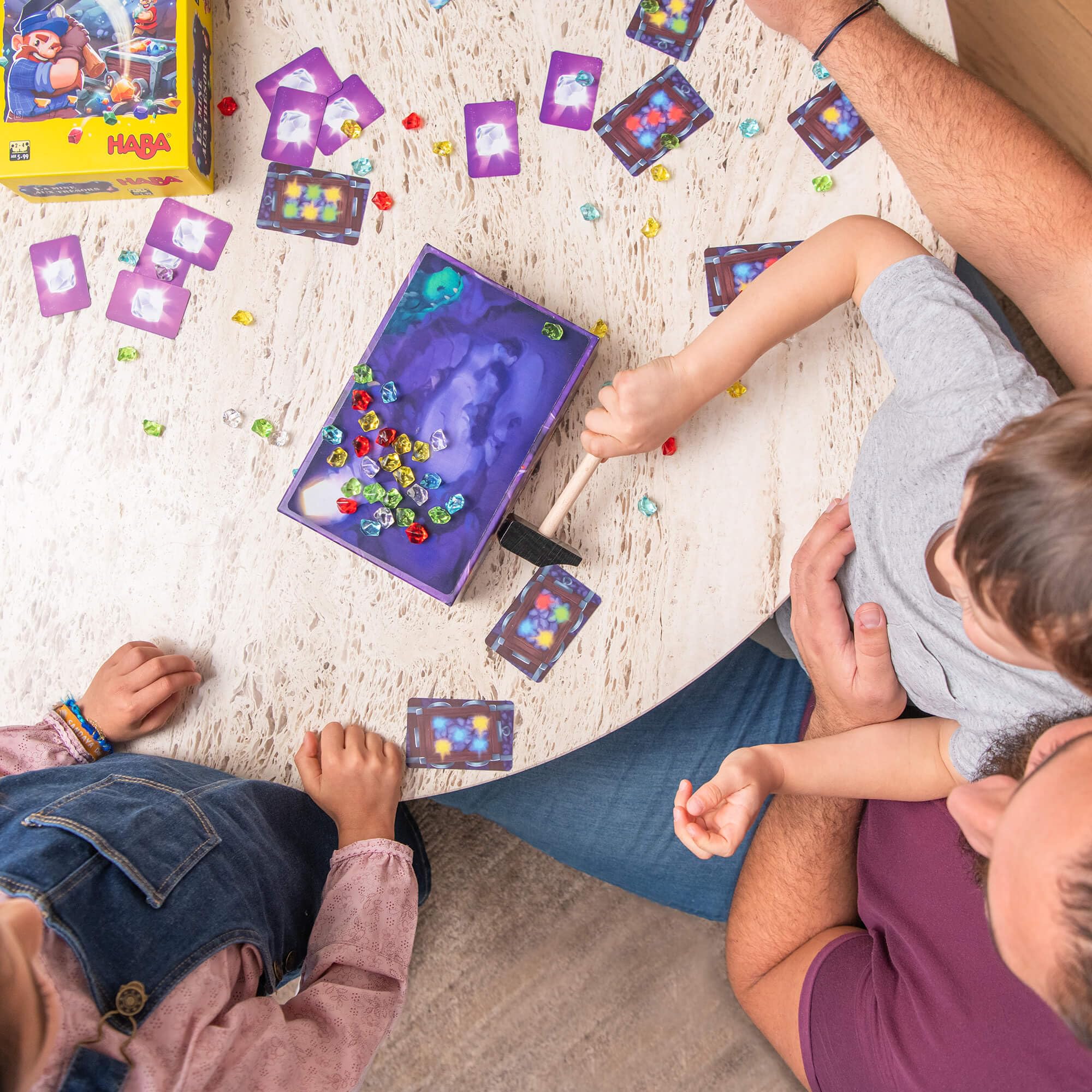 HABA Hammer Time kids at table enjoying a family game night