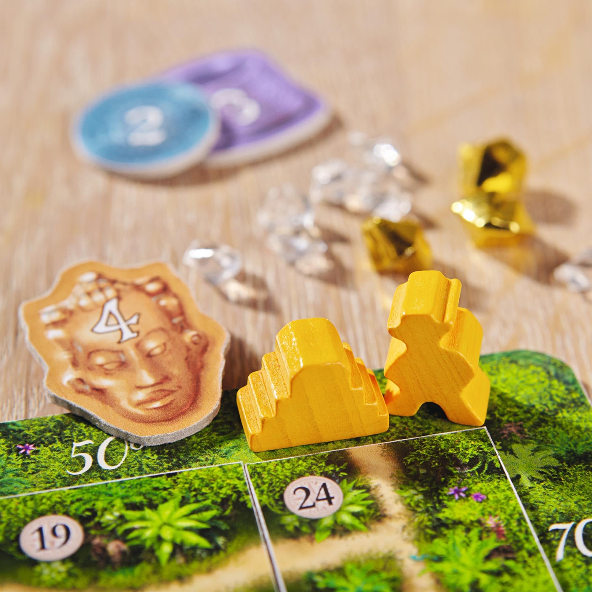 HABA Karuba crystals collection highlighting treasure gathering on board.