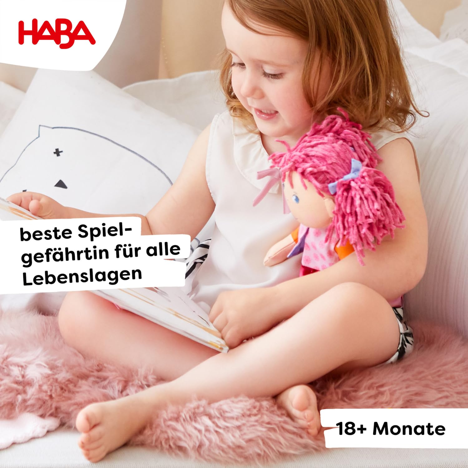 HABA Lilli-Lou embroidered-face with blue eyes invites gentle pretend bonding.