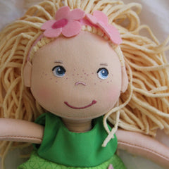HABA Mali removable outfit components enable versatile dress-up play.