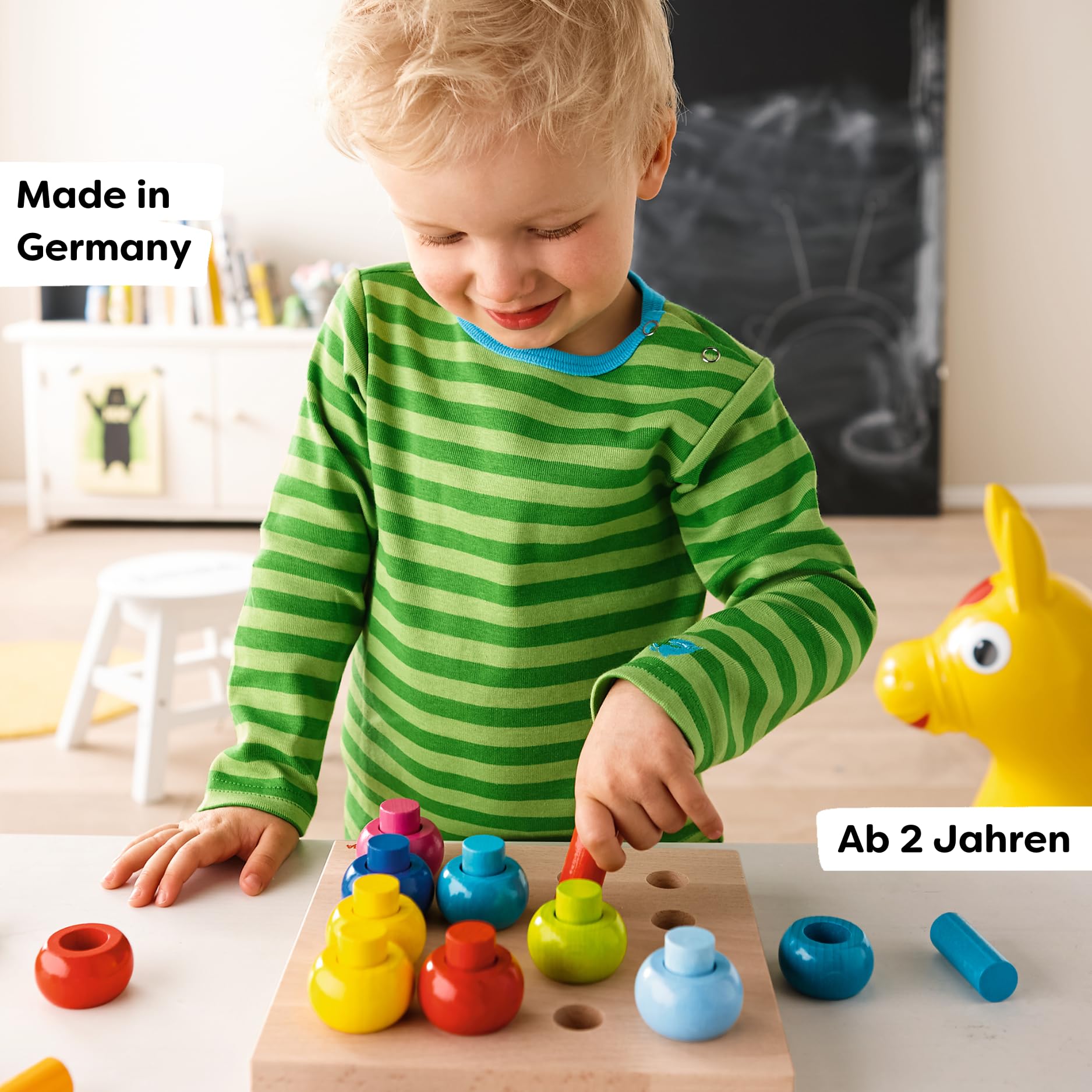 HABA Rainbow Whirls color-sort promotes color recognition and sequencing play.