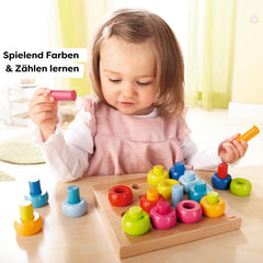 HABA Rainbow Whirls rings offer color sorting to build recognition and dexterity.