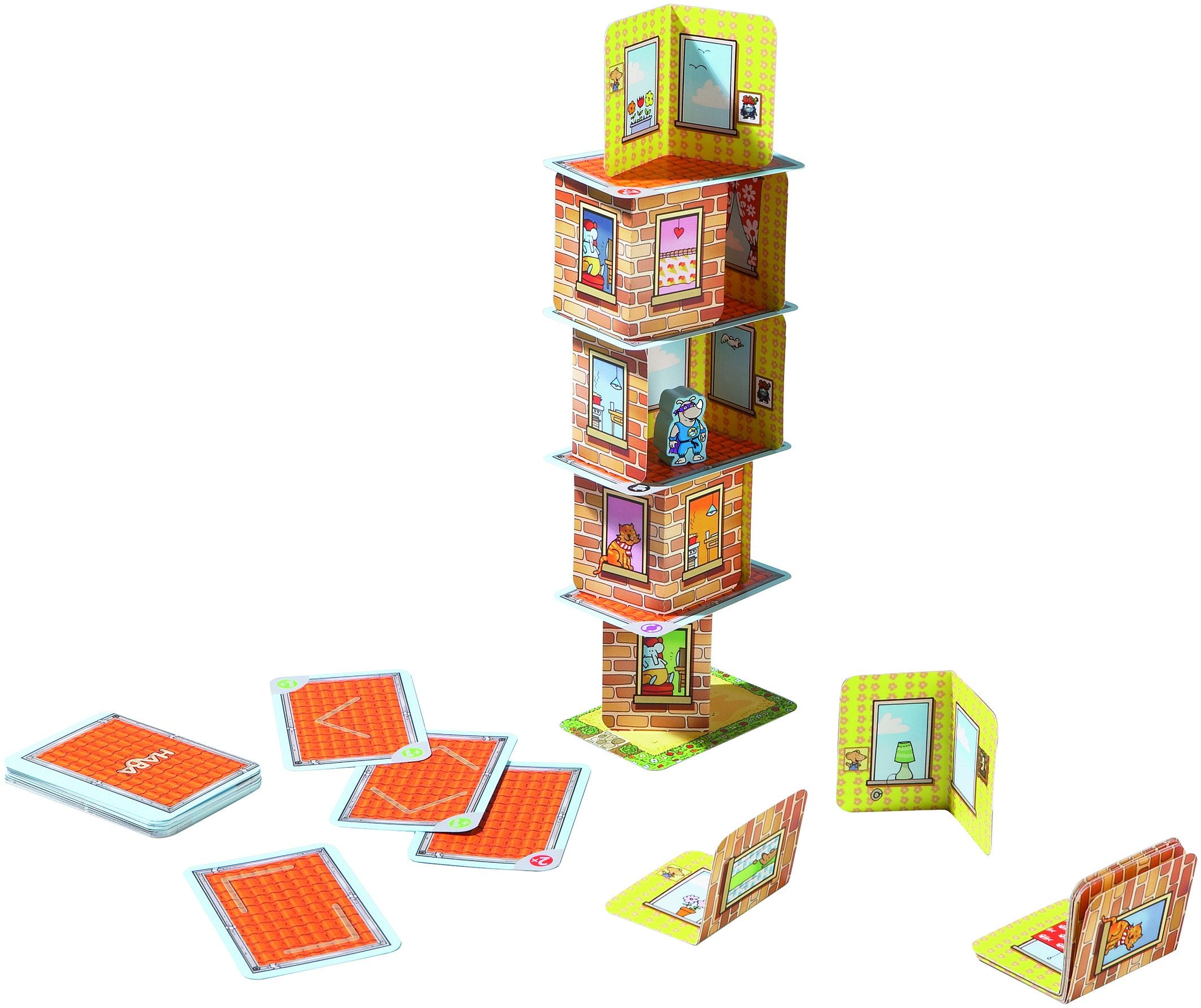 Close-up of balanced tower highlights precision, planning, and careful card placement.