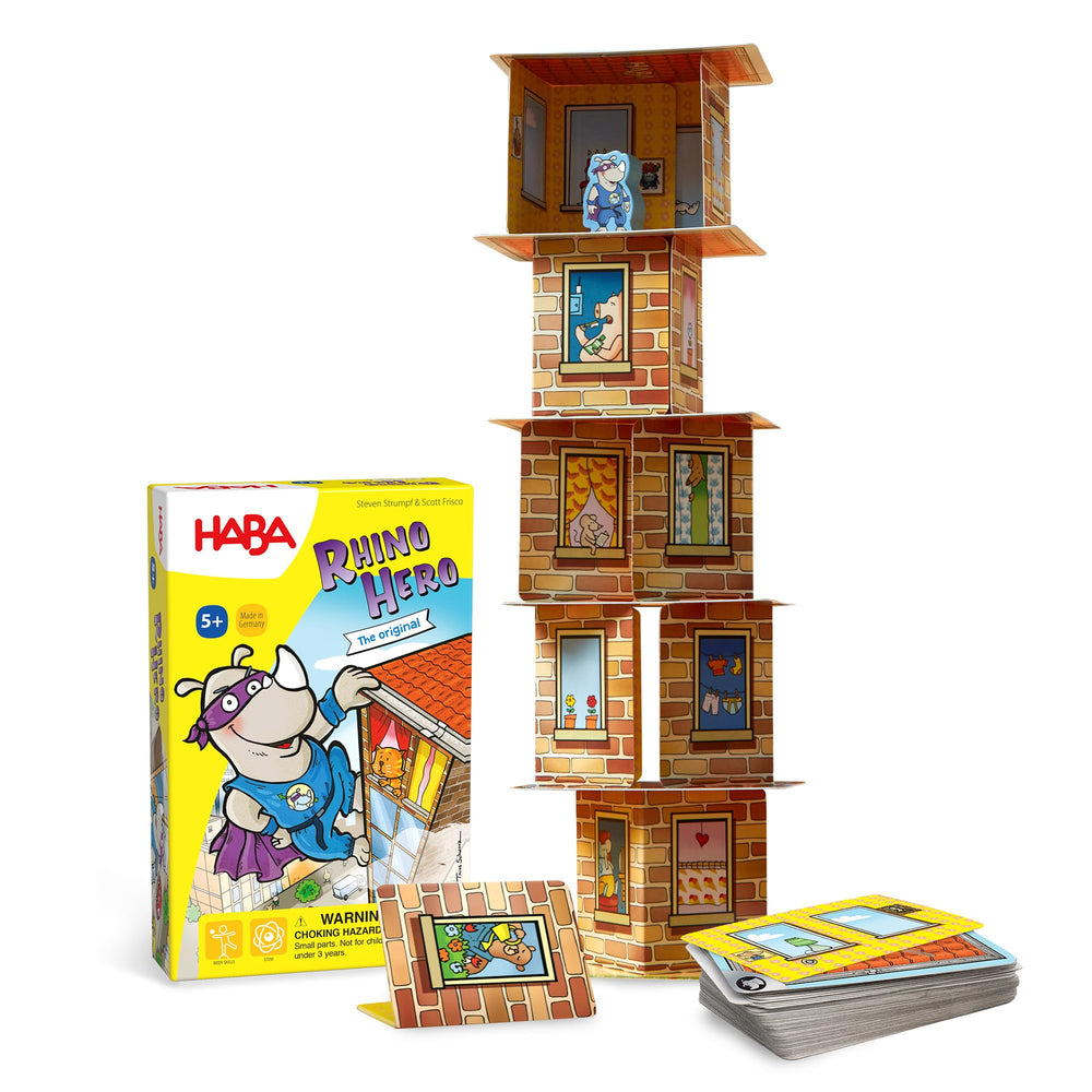 HABA Rhino Hero Game shows a tall tower being built for family play and focus.