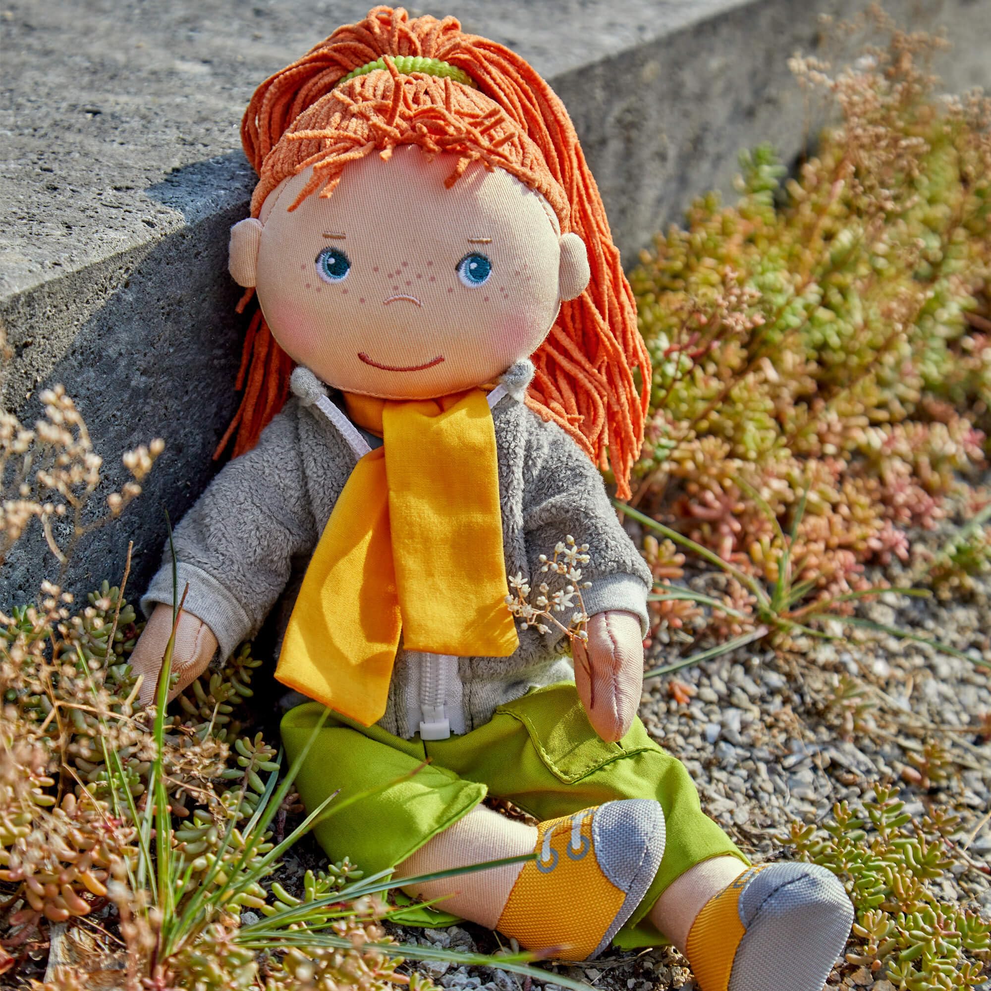 HABA Soley doll features embroidered face for expressive pretend play.