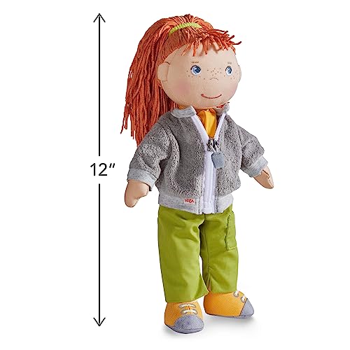 Soley 12-inch soft doll with removable outfit encourages mix-and-match fashion play.