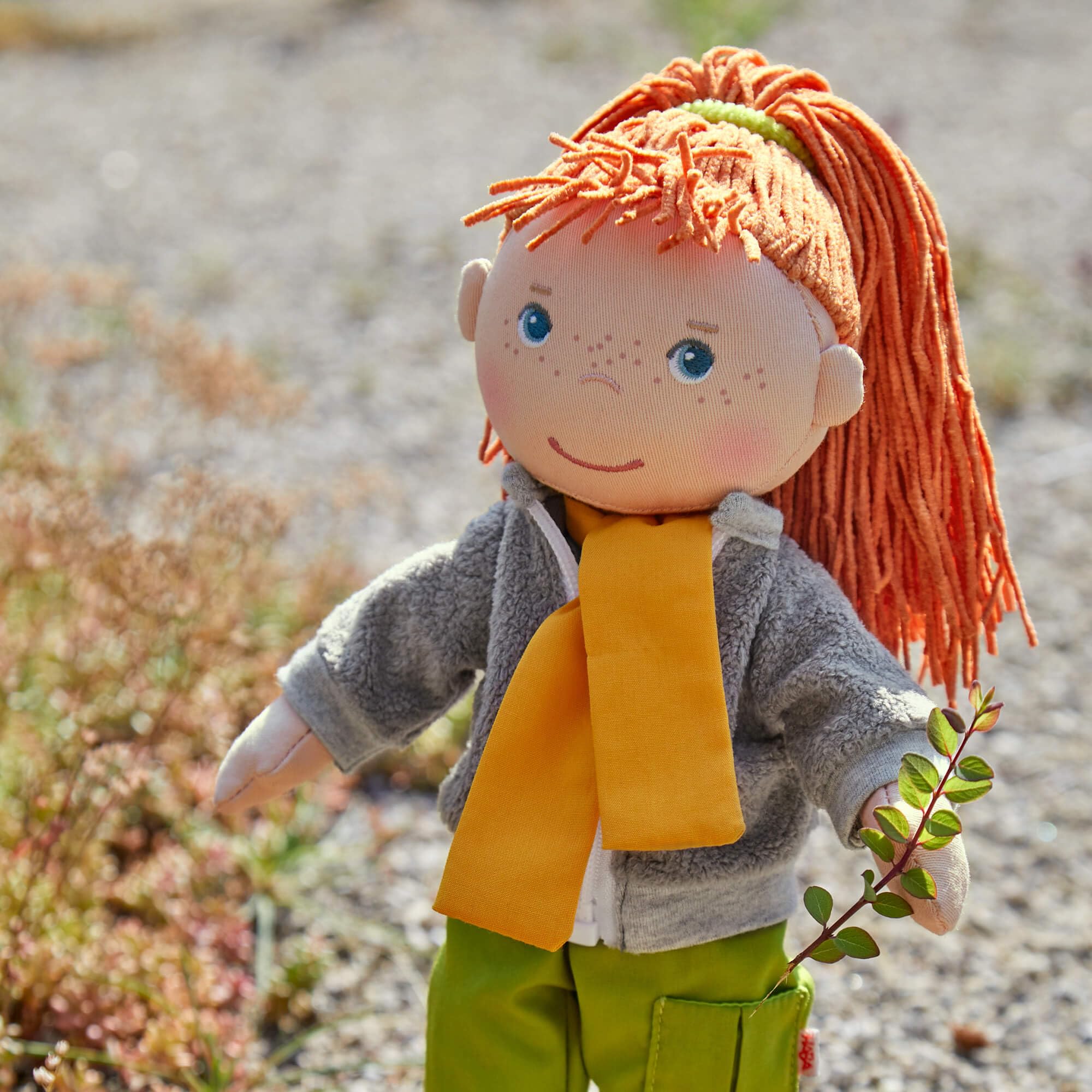 Soley doll with weighted bottom helps easy sitting and cuddling.