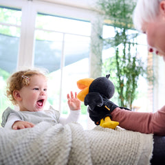 HABA Theo the Raven measures 12 inches tall for comfortable toddler manipulation.