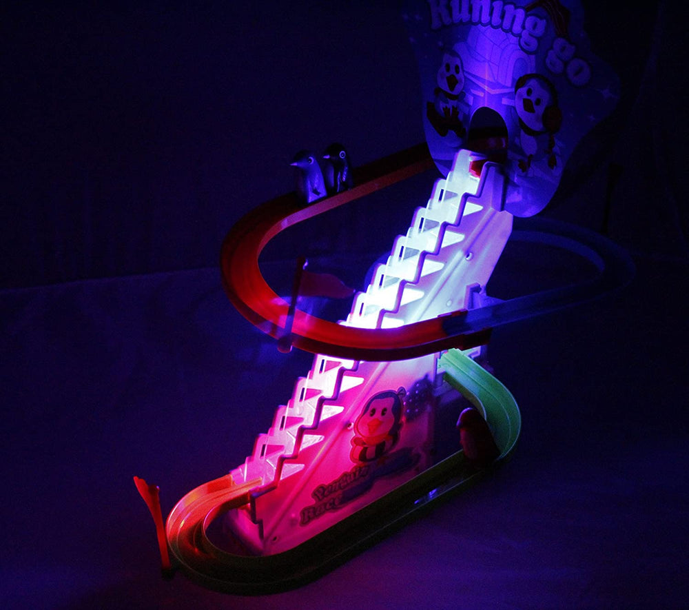 Haktoys penguin slide set battery board powered for lights and motion