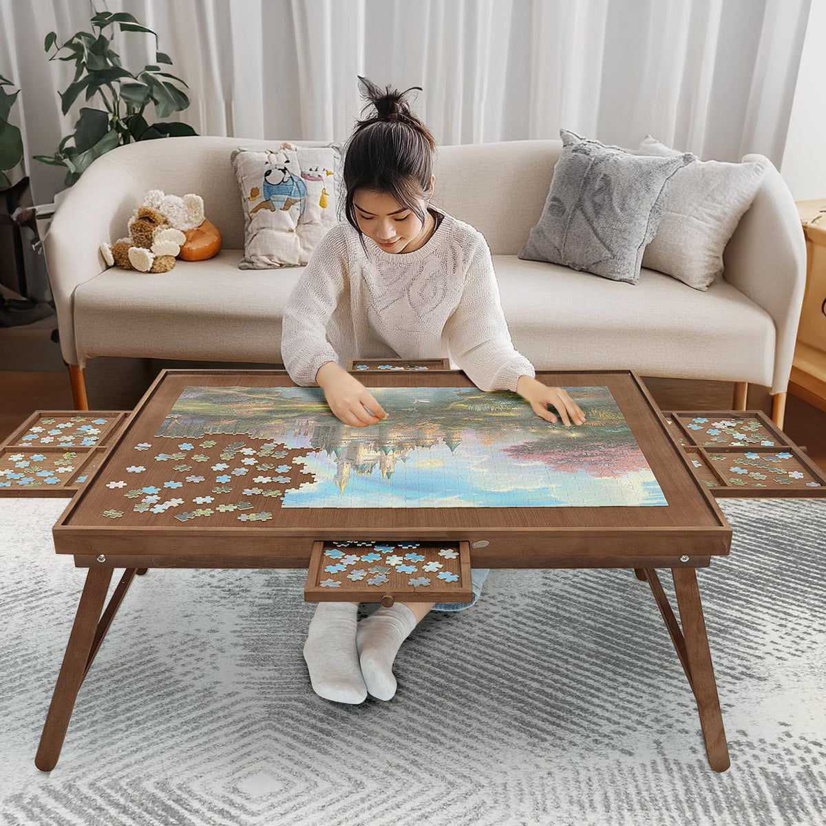 HALLYBEE puzzle table with 1500-piece wooden board for organized play.