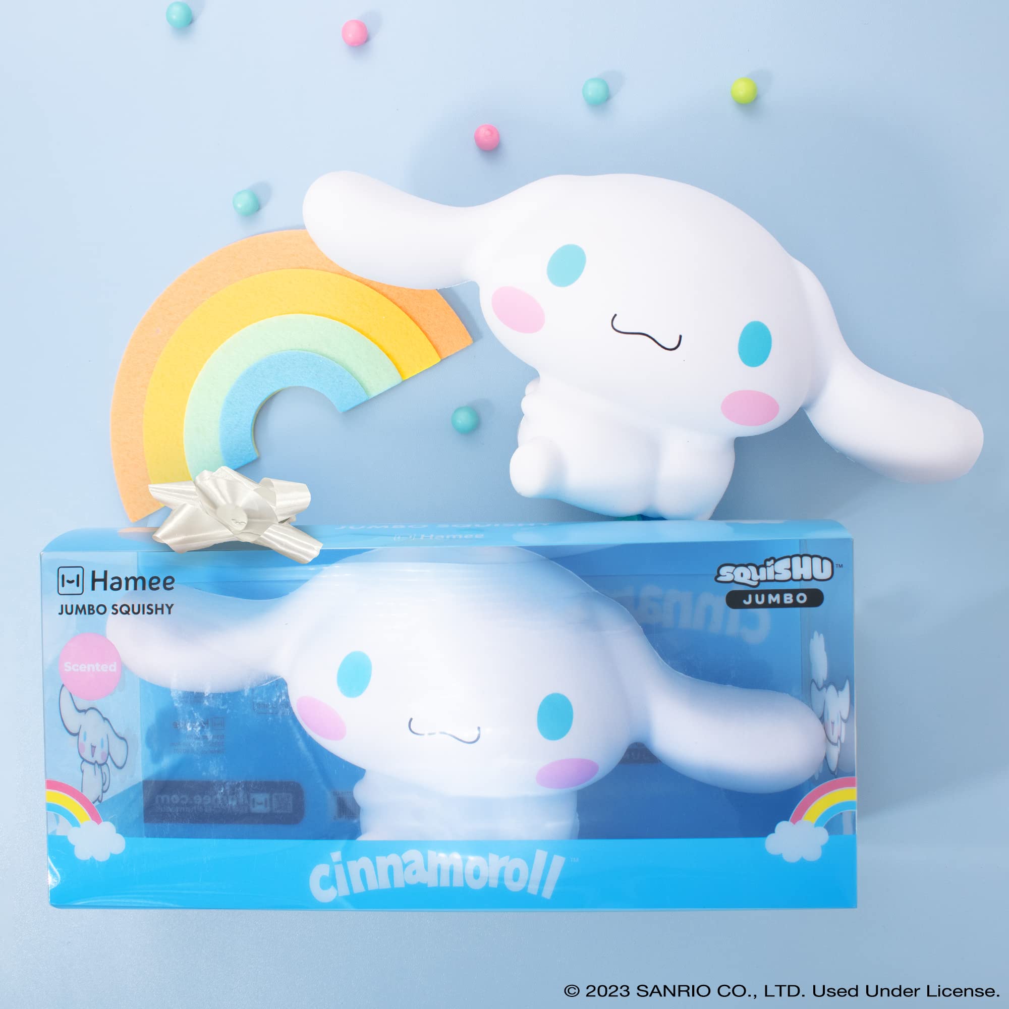 Hamee Cinnamoroll jumbo squishy in hand showing soft texture and size.