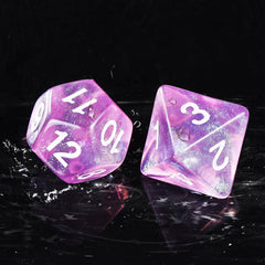 Handan pink transparent glitter D10 dice for accurate percentile rolls.