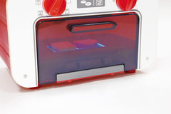 Hape oven light and sound cues teach timing during pretend baking.