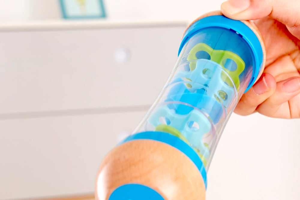 Hape rainmaker is ideal for babies from birth, offering safe, interactive sensory play.
