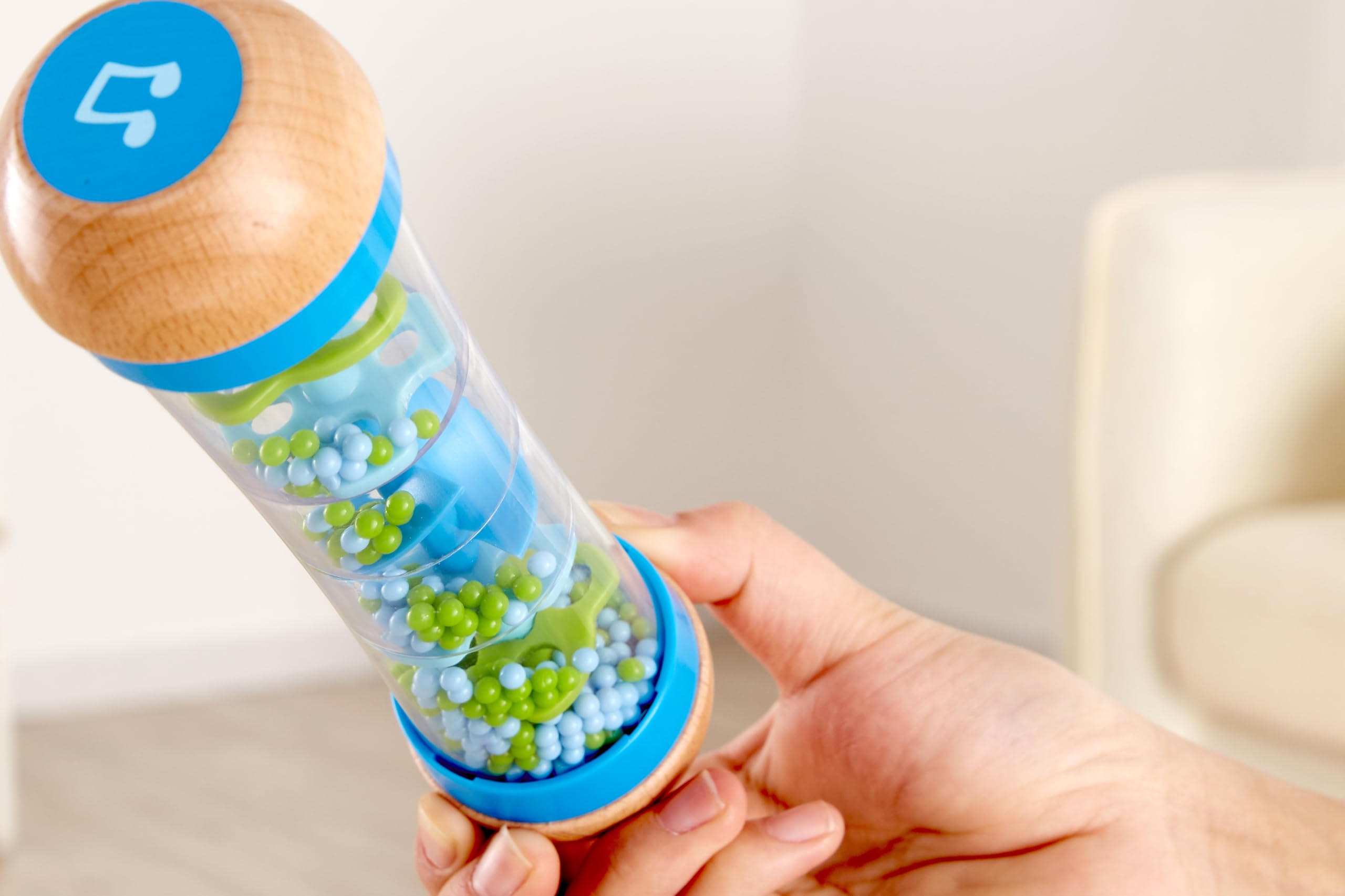 Hape Beaded Raindrops Rainmaker beads trickle to introduce tempo and melodic exploration.