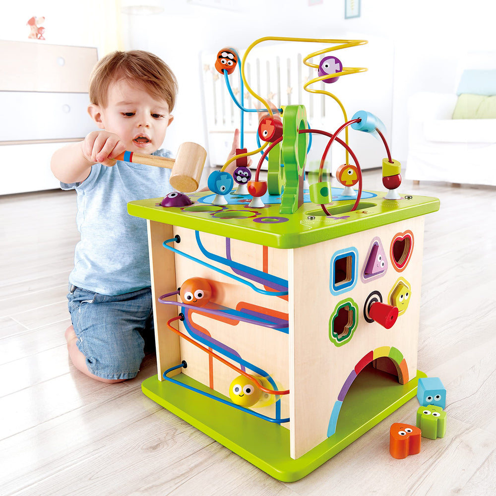 Hape Country Critters Play Cube shape sorter side helps kids learn shapes.