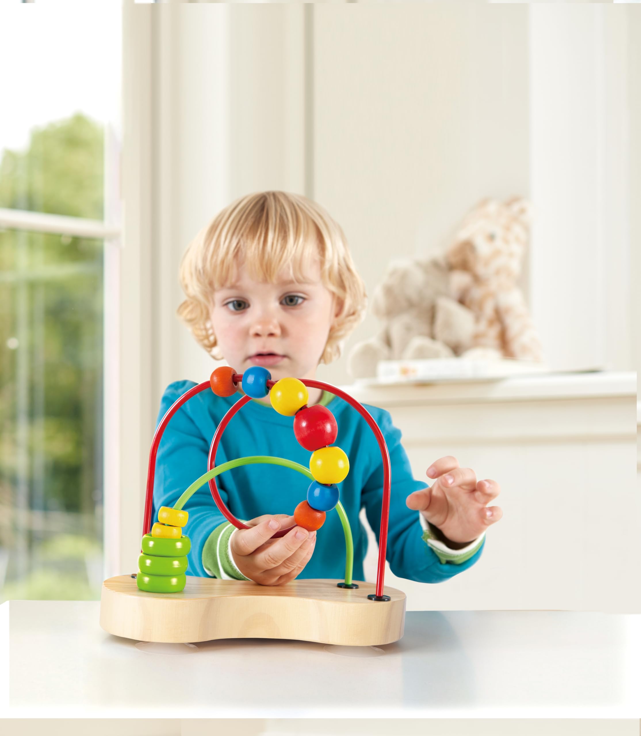 Hape Double Bubble Maze suction cups secure the base to a table.