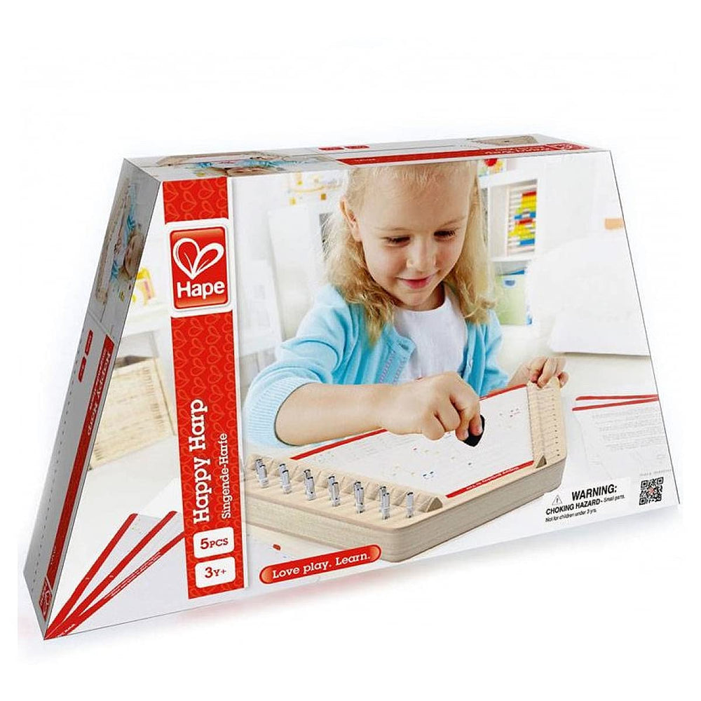 Hape Happy Harp being played by a child, fostering early musical exploration.