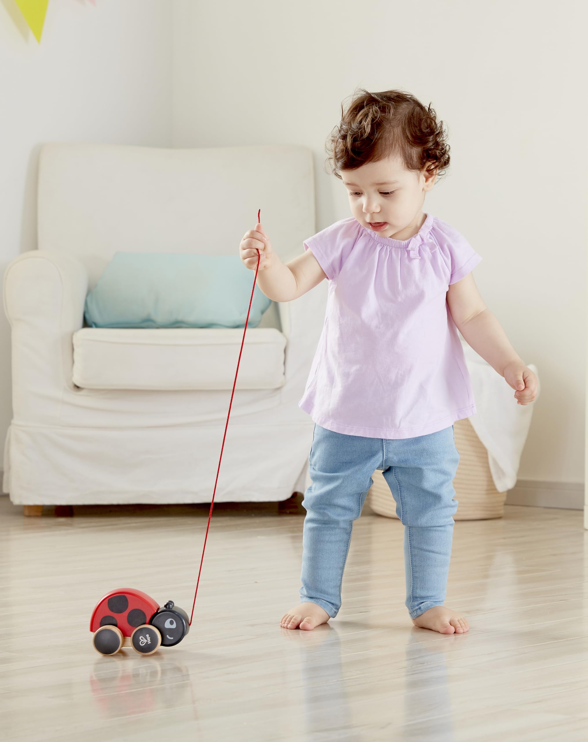 Hape Ladybug wings flap up and down as you pull.