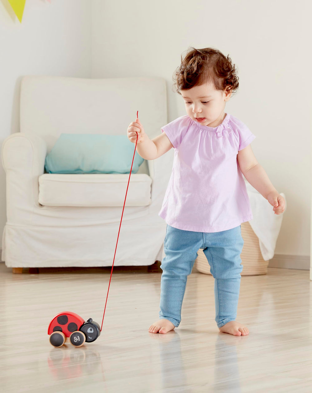 Hape Ladybug wings flap up and down as you pull.