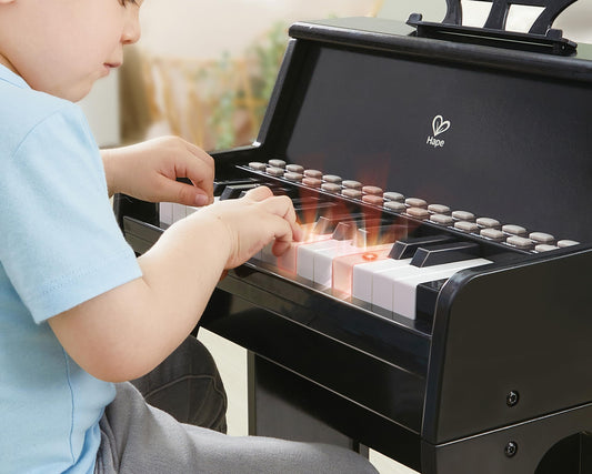 Hape Learn with Lights piano stool supports proper posture during practice
