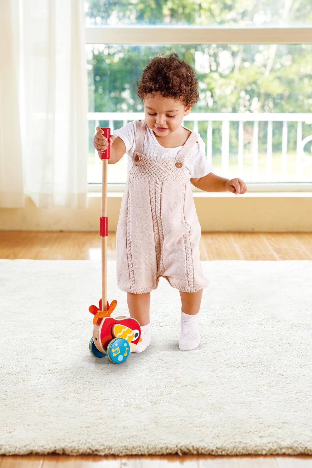 Hape Lilly wooden toy suitable for daycare use encouraging group play and motor skills.