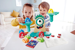 Hape Math Monster Scale small weights are ideal for incremental counting practice.