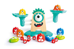 Hape Math Monster Scale teaches counting with weights on the balance arm.