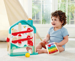 Hape Melody Mansion colorful balls promote color recognition and fine motor exploration