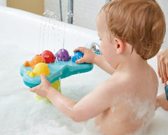Hape bath toy features triple waterproofing for durable tub play.