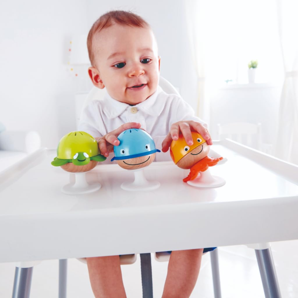 Hape Put-Stay Rattle Set small-hand design promotes easy shaking