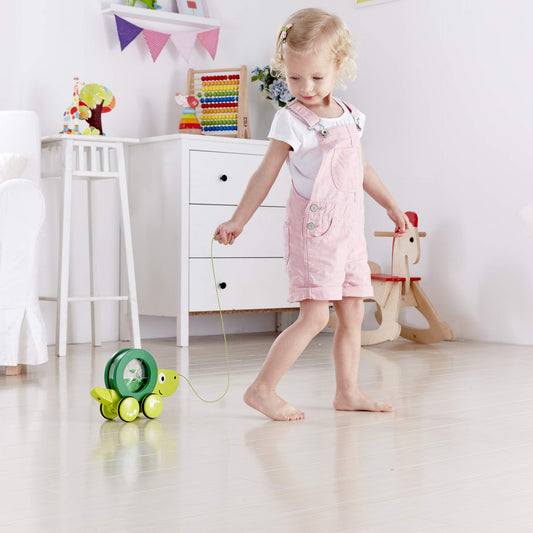 Hape Tito shell water swirl feature adds interactive play as you pull.