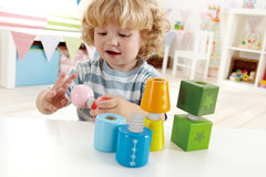 Hape Twist and Turnables kids building creative structures with screws